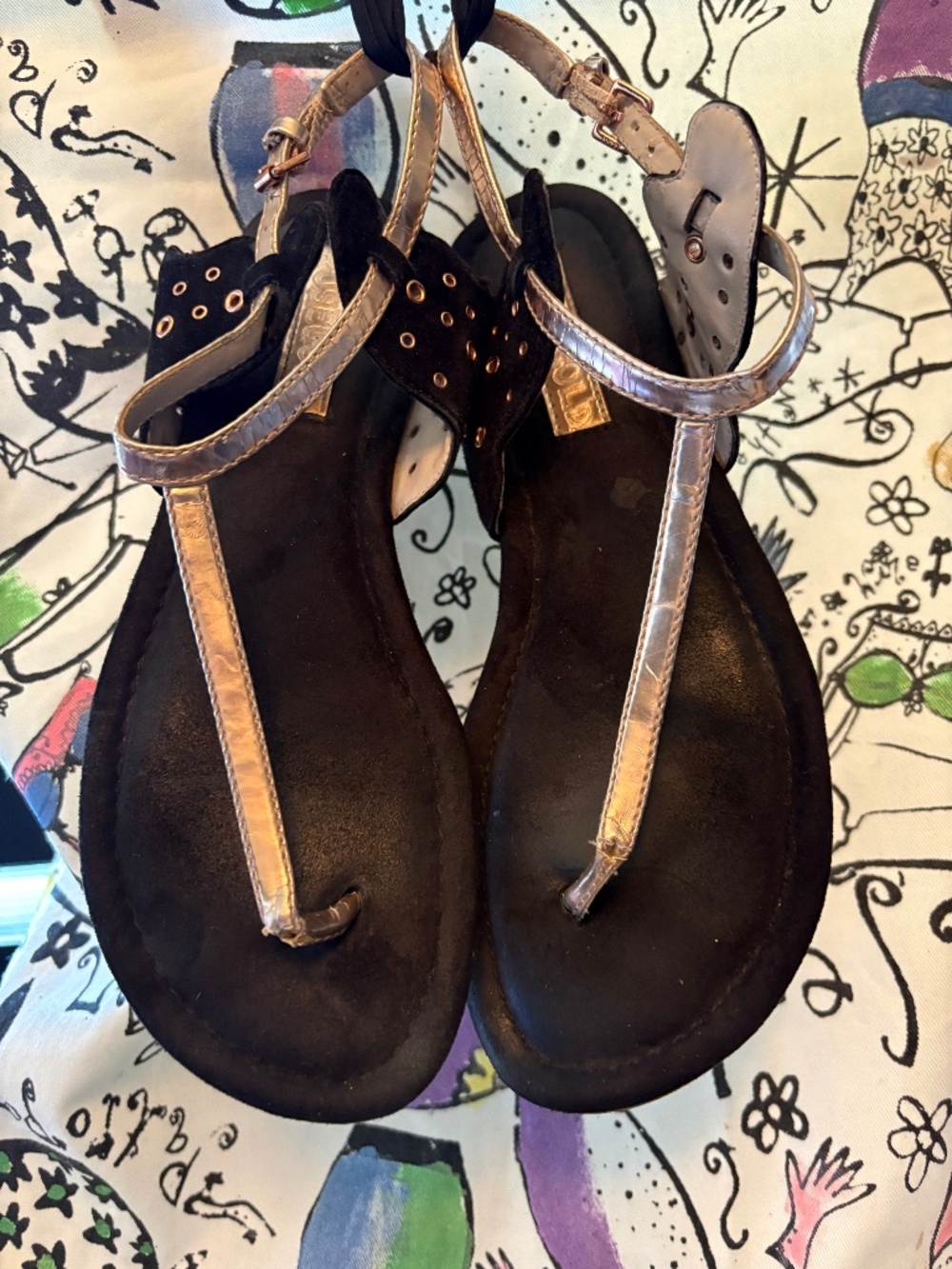 Black and rose gold fake thongs.
